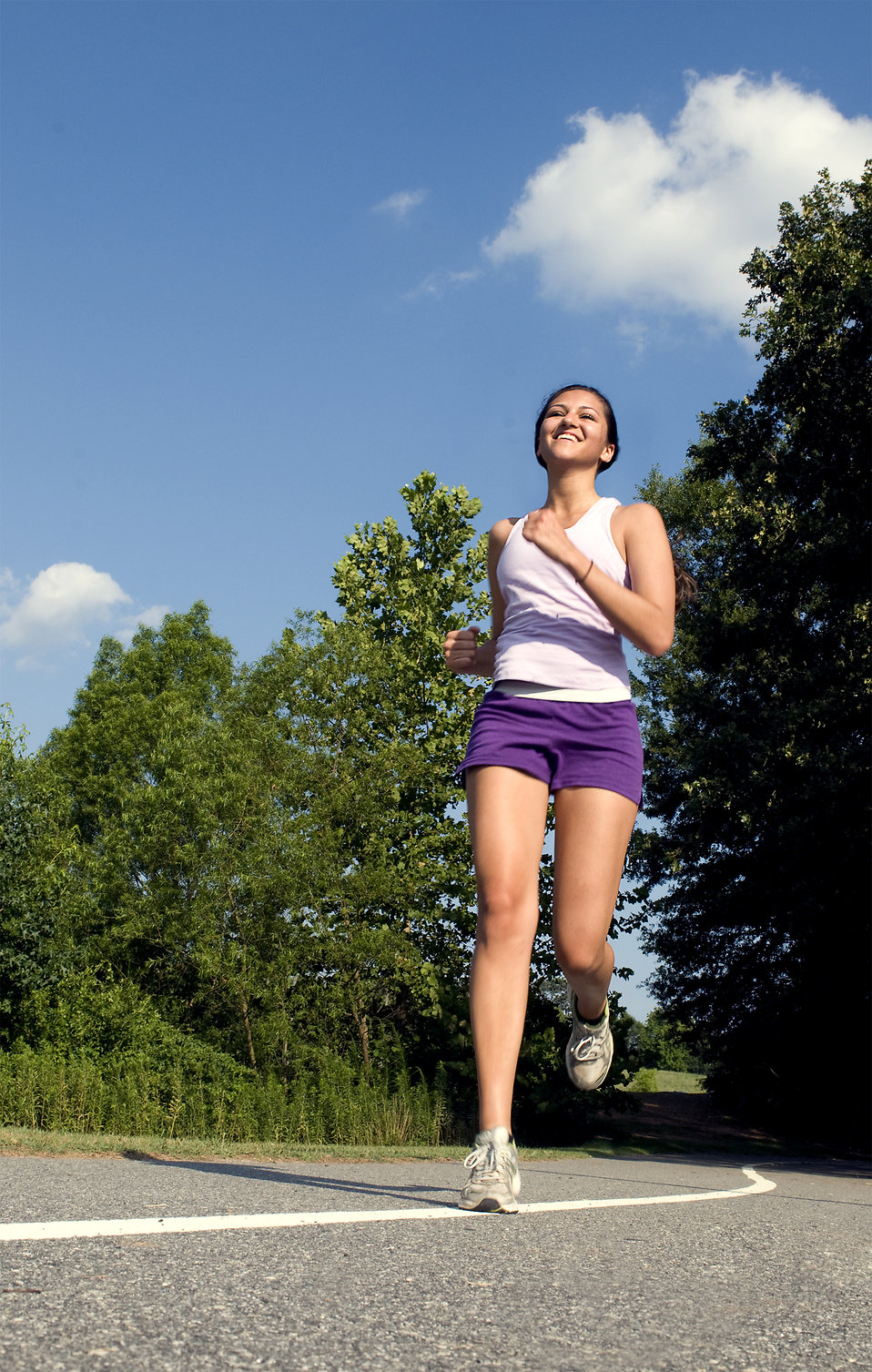 15256-a-young-woman-jogging-outdoors-pv